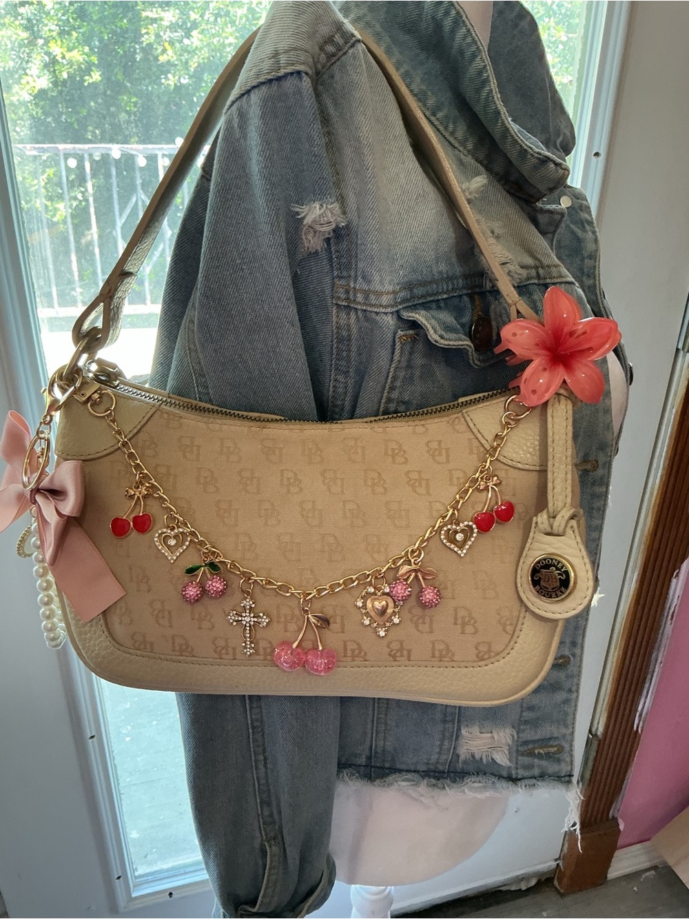 Dooney & Bourke Beige Shoulder Bag with Pink & Red Charm Chain